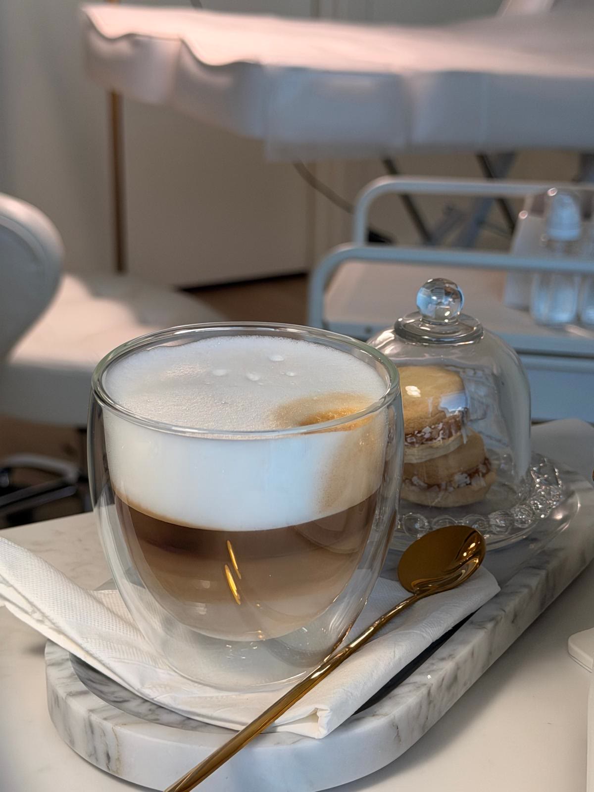 A latte and treat served at the studio