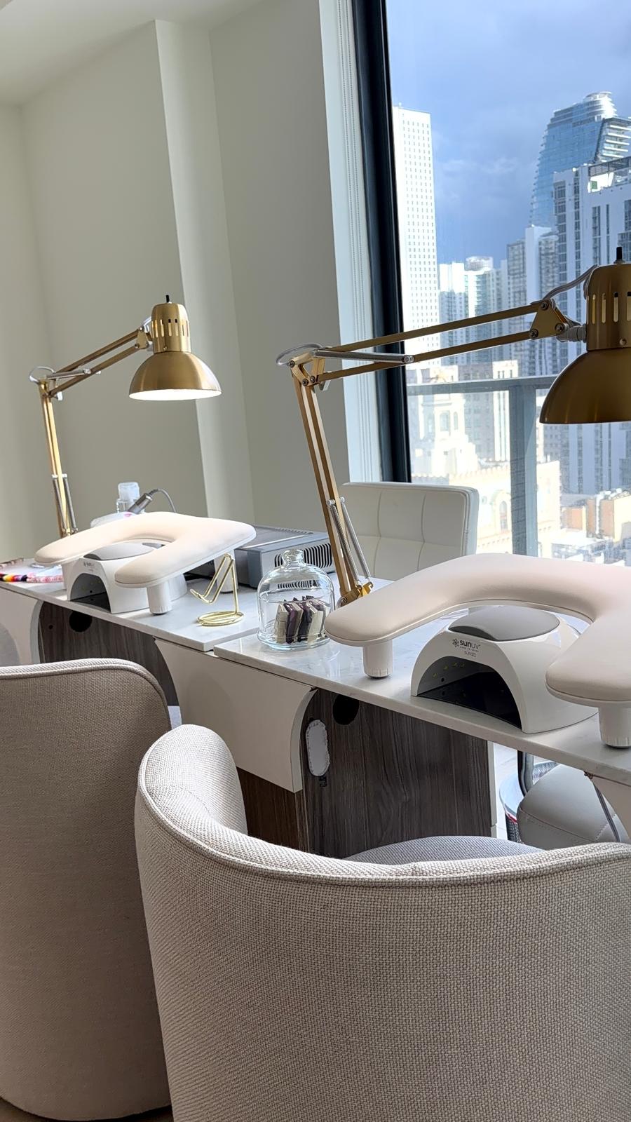 Kraziva manicure station beside the Miami skyline