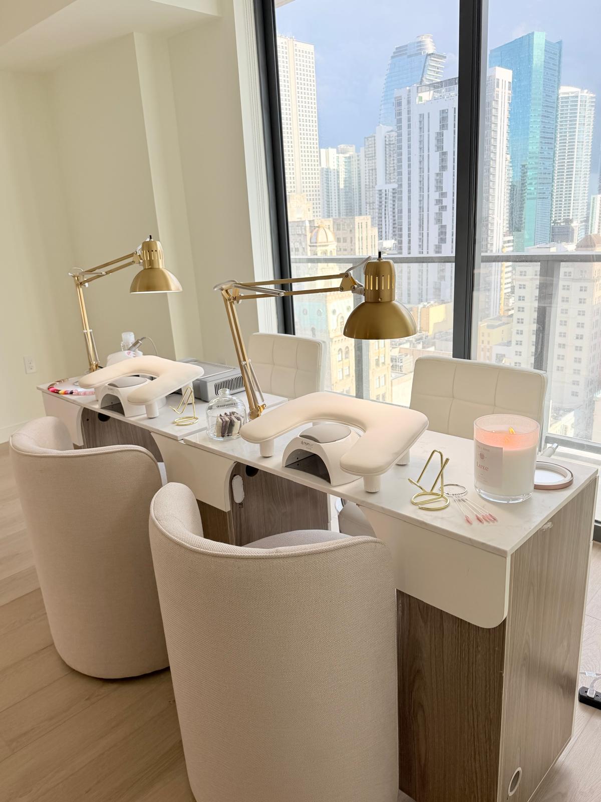 Two manicure stations overlooking downtown Miami